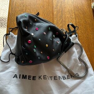 NWOT. Aimee Kestenberg All my heart Rhinestone’s black leather Pouch.